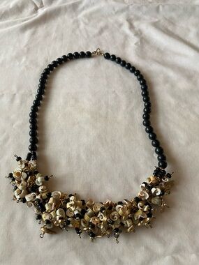 Black Beaded Necklace with Ivory Shell Cluster